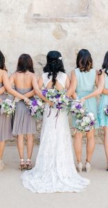 Wedding Hair & Makeup, bridal party with their backs to the camera, showing off their hair